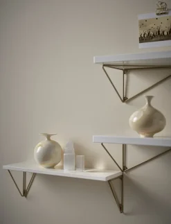 2 Soportes para balda Pythagoras, latón