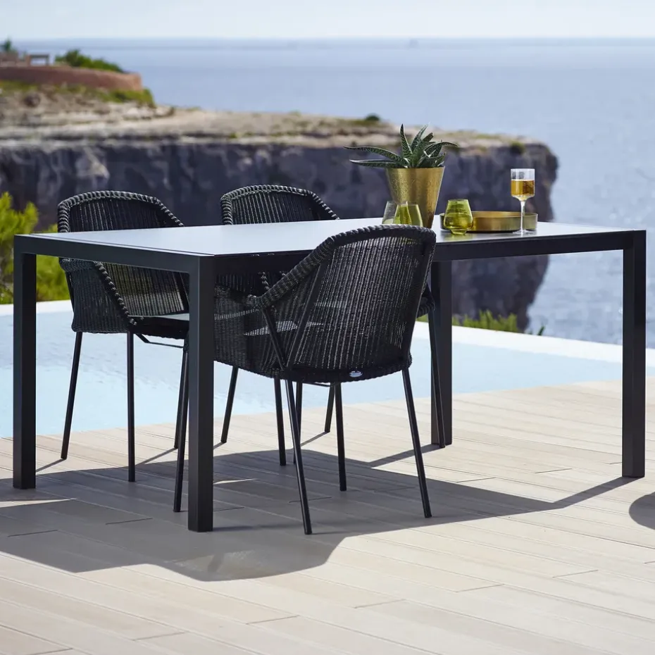 Silla con reposabrazos apilable Breeze weave, Black